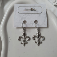 Load image into Gallery viewer, Fleur-De-Lis Huggies Earrings - Silver