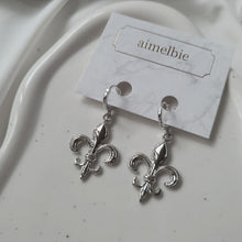 Load image into Gallery viewer, Fleur-De-Lis Huggies Earrings - Silver