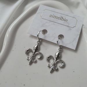 Fleur-De-Lis Huggies Earrings - Silver