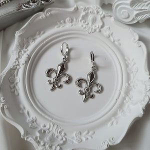 Fleur-De-Lis Huggies Earrings - Silver