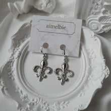 Load image into Gallery viewer, Fleur-De-Lis Huggies Earrings - Silver