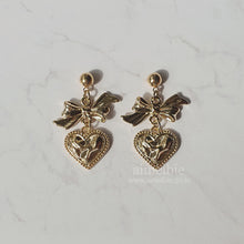 Load image into Gallery viewer, Gold laced heart and bow earrings