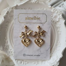 Load image into Gallery viewer, Gold laced heart and bow earrings