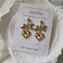 Load image into Gallery viewer, Gold laced heart and bow earrings