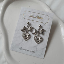 Load image into Gallery viewer, Silver laced heart and bow earrings