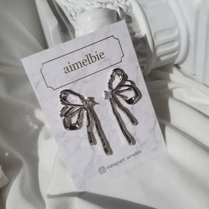 [Aespa Winter, NingNing Earrings] Metalic Liquid Ribbon Earrings - Silver Color