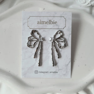 [Aespa Winter, NingNing Earrings] Metalic Liquid Ribbon Earrings - Silver Color