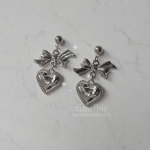 Silver laced heart and bow earrings