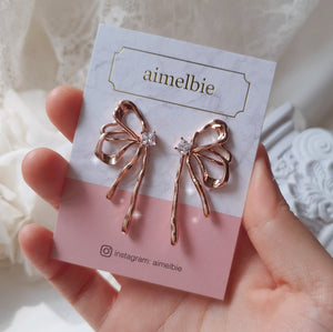 Metalic Liquid Ribbon Earrings - Rosegold