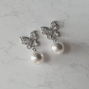 Butterfly and pearl earrings