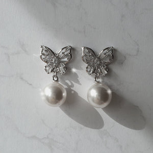 Butterfly and pearl earrings