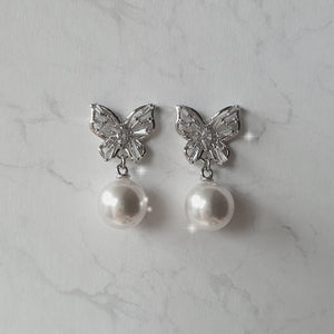 Butterfly and pearl earrings