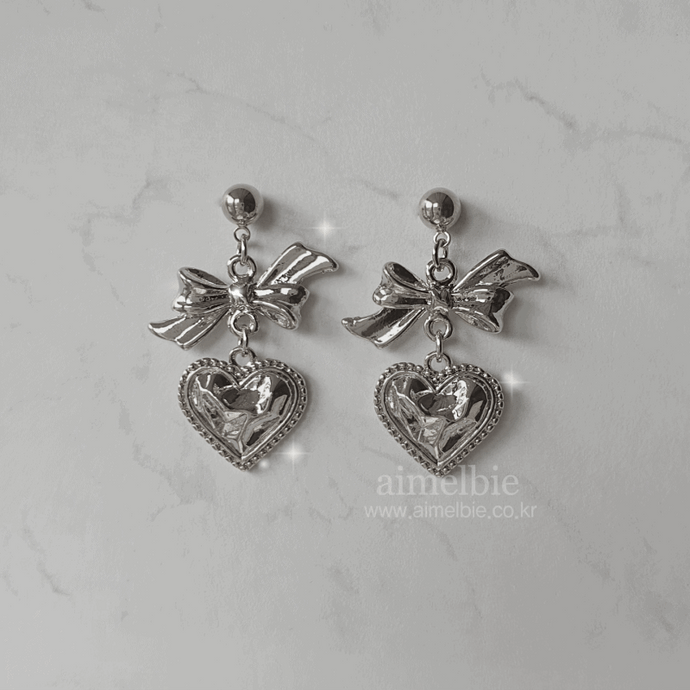 Silver laced heart and bow earrings