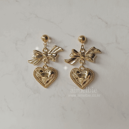 Gold laced heart and bow earrings